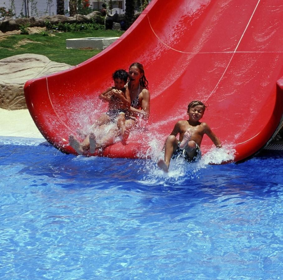 Sharm Dreams Vacation Club - Aqua Park Hotel Екстериор снимка A water slide