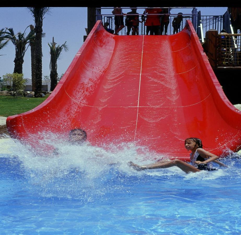 Sharm Dreams Vacation Club - Aqua Park Hotel Екстериор снимка A water slide