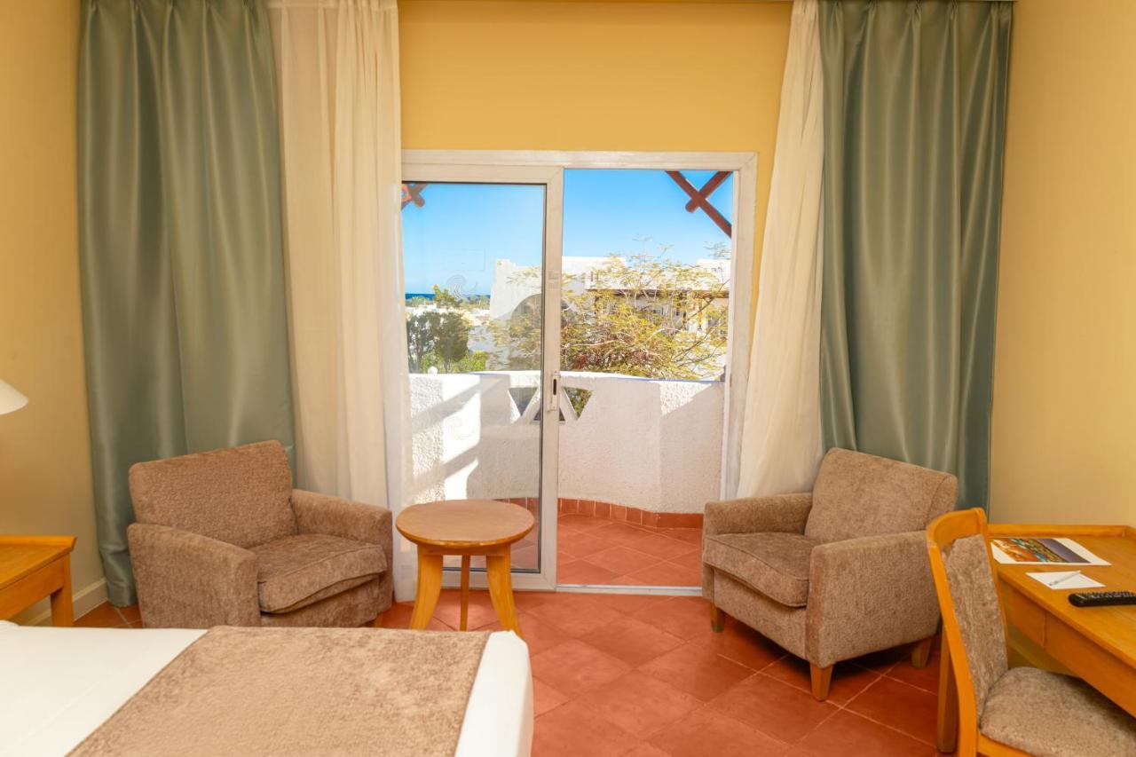 Sharm Dreams Vacation Club - Aqua Park Hotel Екстериор снимка A room at the hotel